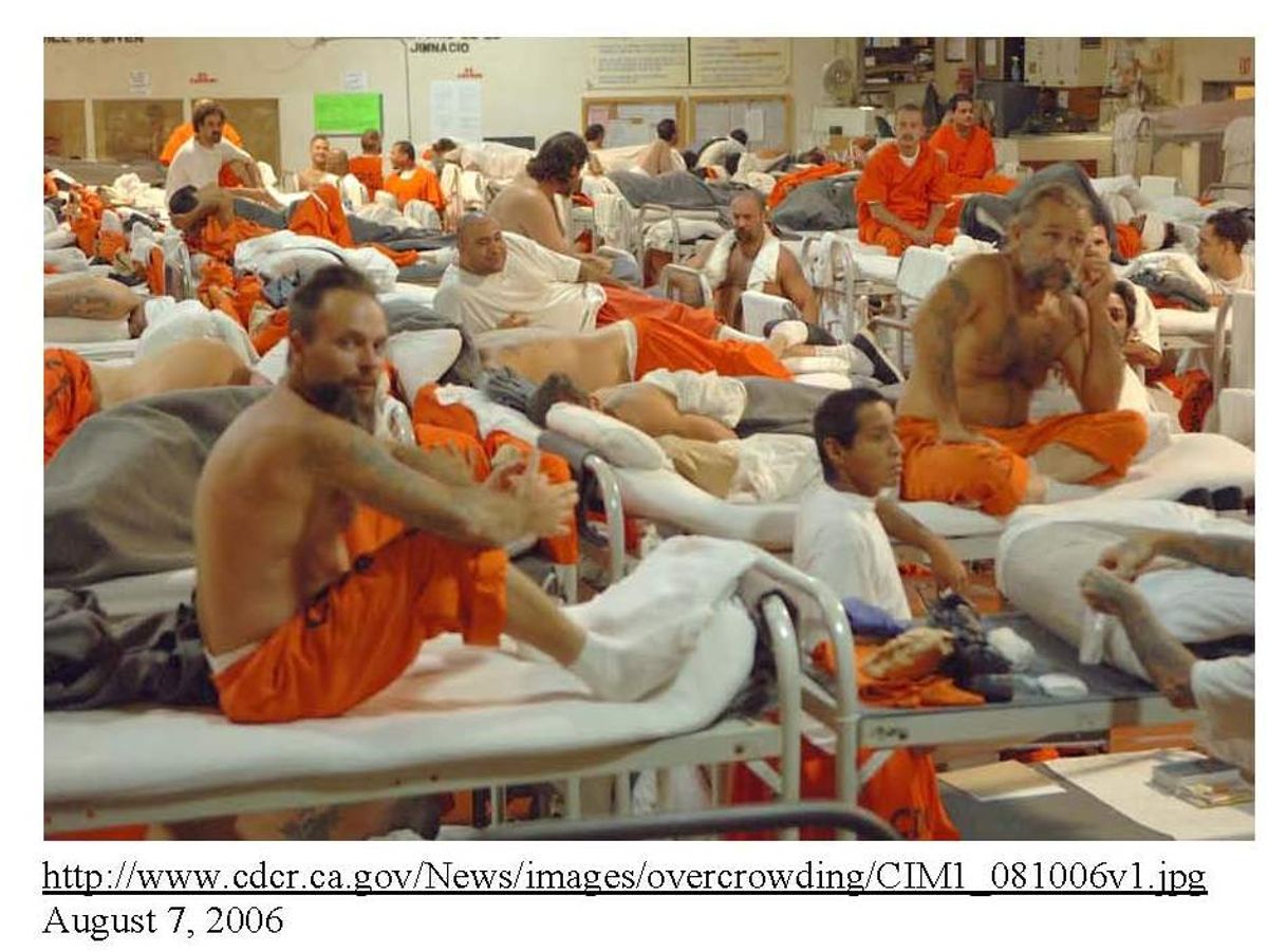 An exhibit from Plata v. Brown showing male prisoners in an overcrowded California facility.