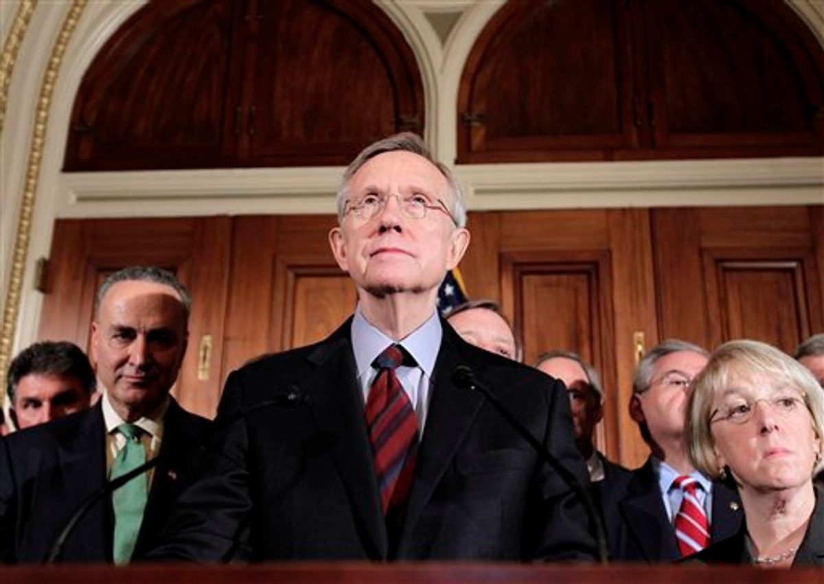 Senate Majority Leader Harry Reid, D-Nev. pauses during a news conference on Capitol Hill in Washington, Friday, April 8, 2011, after meeting with the Senate Democratic Caucus. From left are: Sen. Joe Manchin, D-W.Va., Sen. Charles Schumer, D-N.Y., Reid, and Senate Majority Whip Richard Durbin of Ill., Sen. Thomas Carper, D-Del., Sen. Robert Menendez, D-N.J., and Sen. Patty Murray, D-Wash. (AP Photo/J. Scott Applewhite)                            (AP)