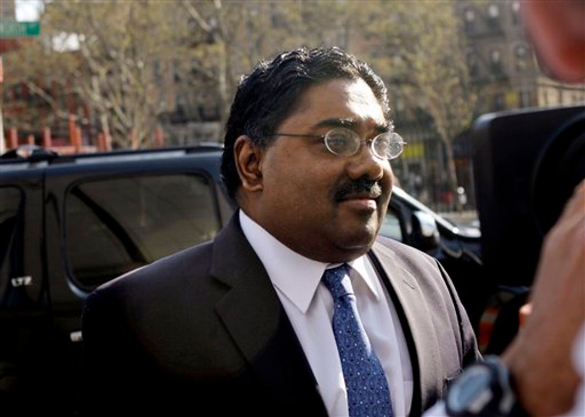 Raj Rajaratnam enters federal court in New York, Tuesday, April 26, 2011. Jurors continue to consider the fate of the hedge fund founder accused of making tens of millions of dollars through insider trading. (AP Photo/Seth Wenig) (AP)