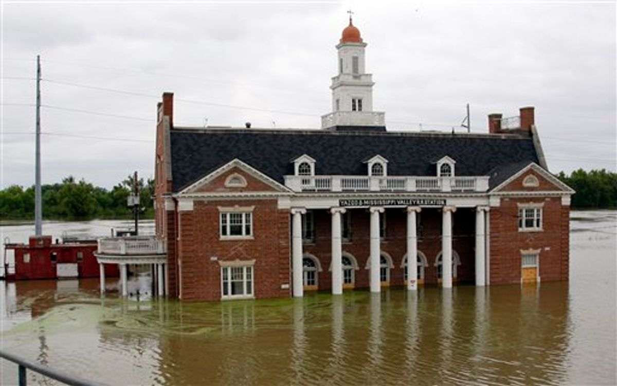 Mississippi River floodwaters continue to creep up the Old Train Depot in downtown Vicksburg, Miss., Saturday, May 14, 2011. The waters from the Mississippi River and its tributaries are not expected to crest in Vicksburg until Thursday. (AP Photo/Rogelio V. Solis)  (AP)