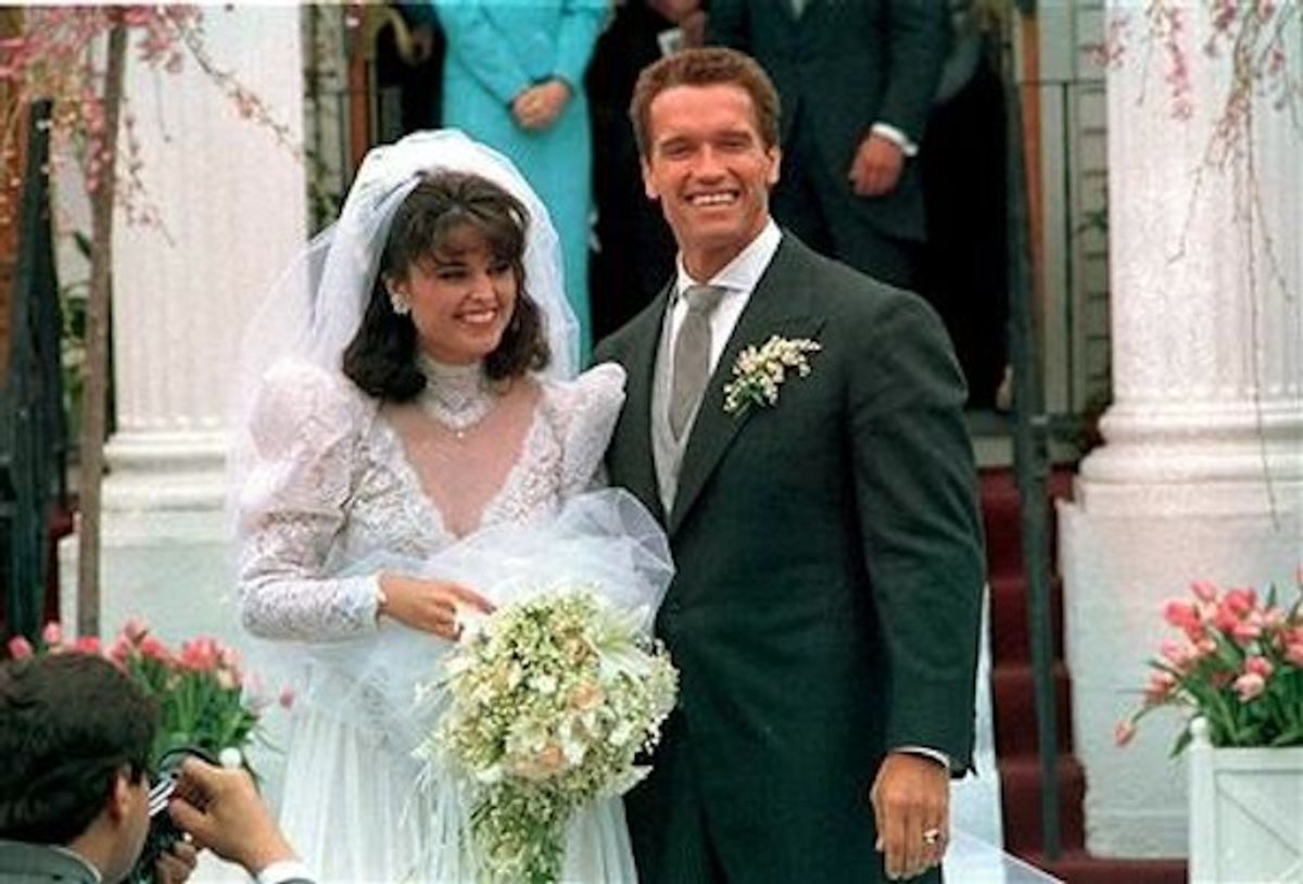 FILE -- In an April 25, 1986 file photo Actor Arnold Schwarzenegger poses with his bride Maria Shriver following their wedding ceremony in Hyannis, Mass. Former California Gov. Arnold Schwarzenegger and his wife of 25 years, Maria Shriver, announced Monday May 9, 2011, that they are separating.   (AP Photo/file) (AP)