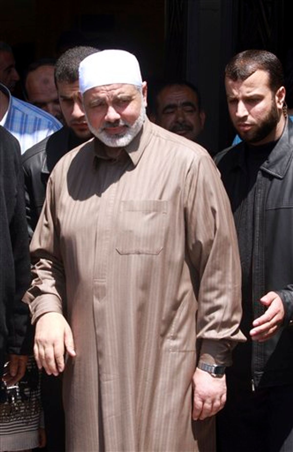 Gaza's Hamas Prime Minister Ismail Haniyeh leaves a mosque after Friday prayers in Gaza City, Friday, April 29, 2011. Officials from the rival Fatah and Hamas movements said Wednesday, they have reached an initial agreement on ending a four-year-old rift that has left them divided between rival governments in the West Bank and Gaza Strip.(AP Photo/Hatem Moussa) (AP)