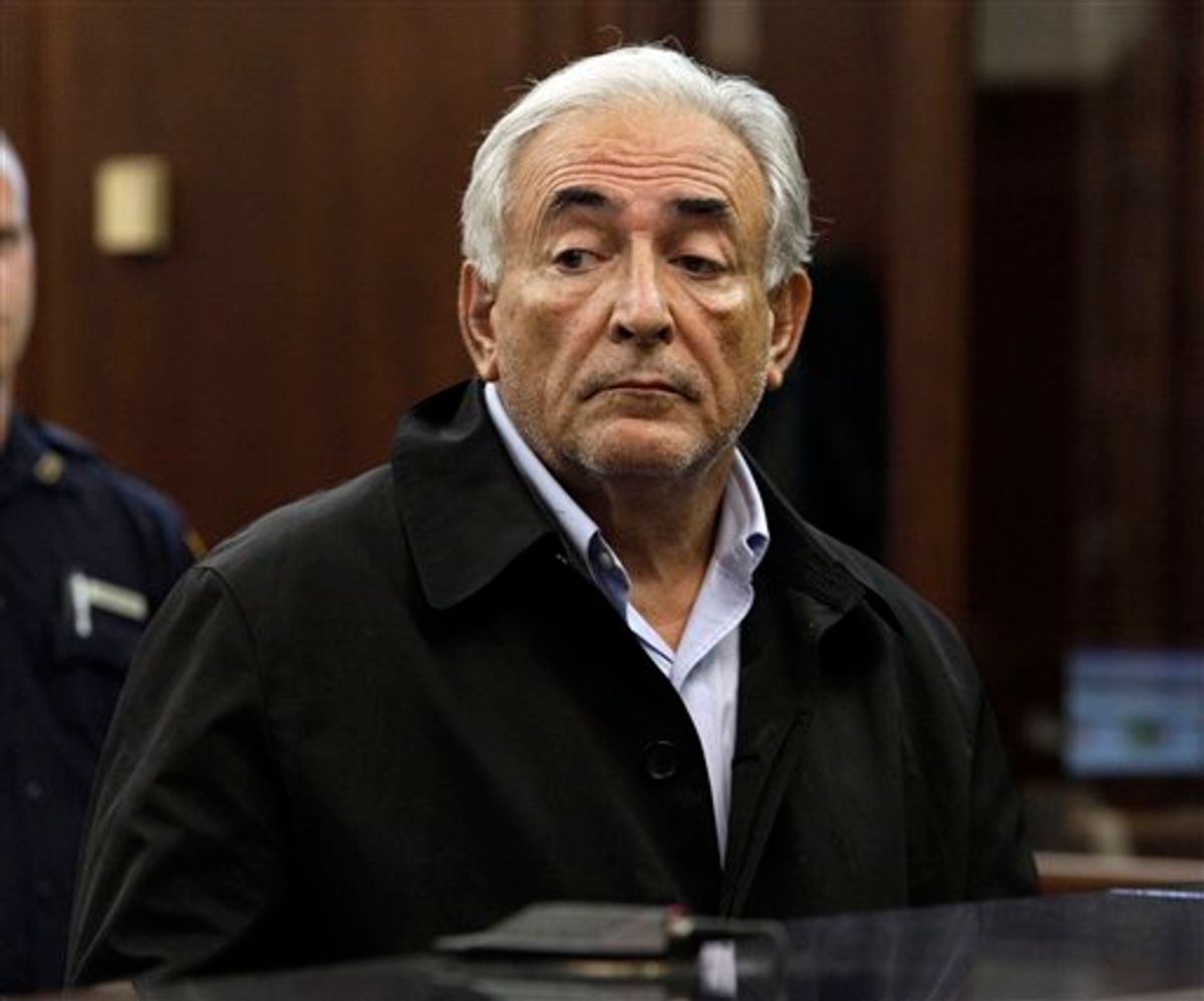 FILE - In this May 16, 2011 file photo, Dominique Strauss-Kahn, head of the International Monetary Fund, is arraigned in Manhattan Criminal Court. Strauss-Kahn, a wealthy French politician accustomed to high living and globe-trotting, wants off Rikers Island, a modern-day Bastille known as one of America's largest and roughest jail complexes. Behind bars on Rikers since Monday, the beleaguered IMF chief is scheduled to return to a Manhattan court on Thursday afternoon to again ask for bail on charges he sexually assaulted a hotel maid _ a move seemed certain to face vigorous opposition by prosecutors. (AP Photo/Richard Drew, Pool) (AP)