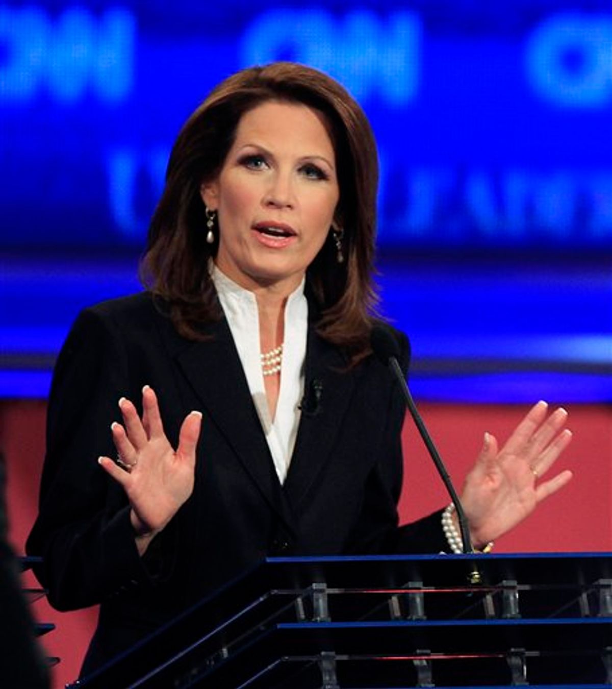 Rep. Michele Bachmann, R-Minn., answers a question during the first New Hampshire Republican presidential debate at St. Anselm College in Manchester, N.H., Monday, June 13, 2011. (AP Photo/Jim Cole) (AP)