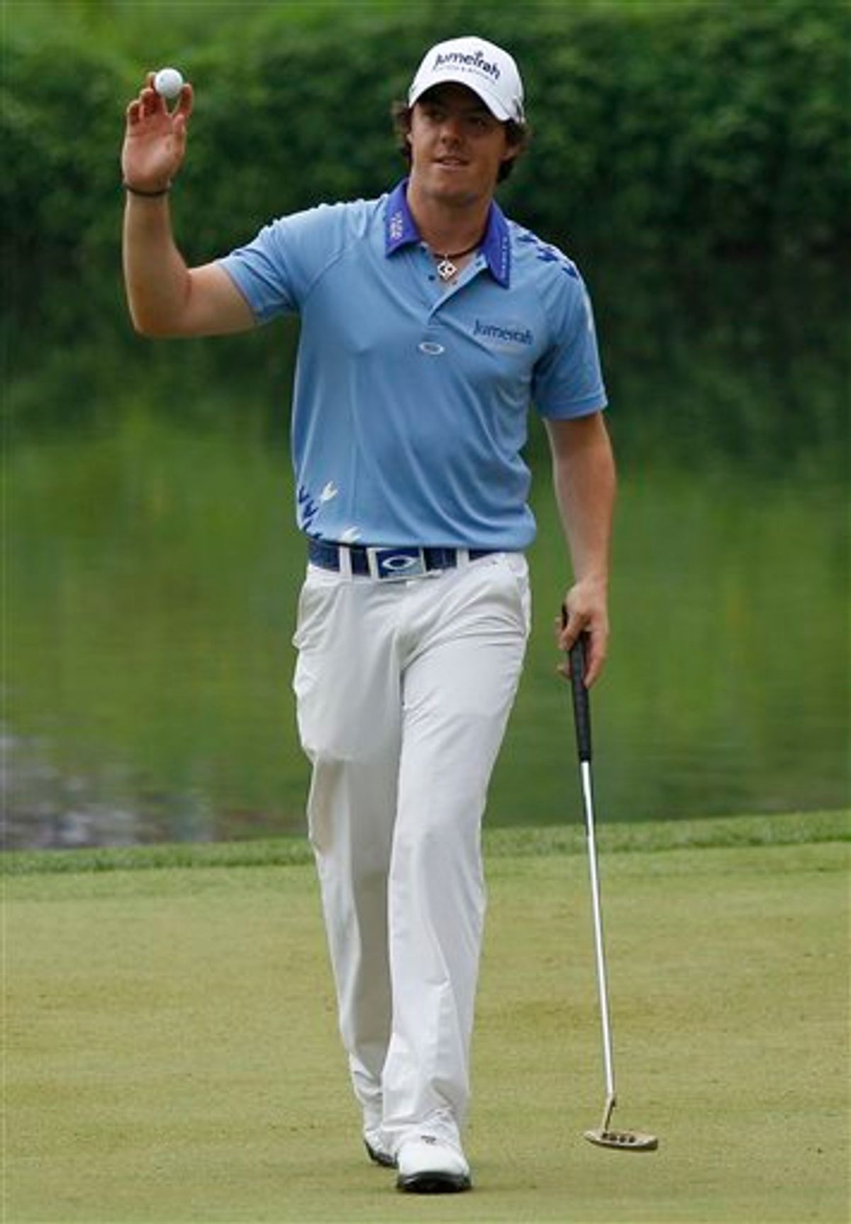 Rory McIlroy, Northern Ireland, waves to the gallery on the 10th green during the final round of the U.S. Open Championship golf tournament in Bethesda, Md., Sunday, June 19, 2011. (AP Photo/Matt Slocum) (AP)