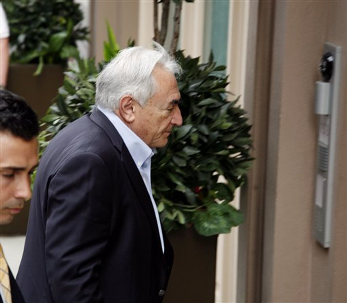Former International Monetary Fund chief Dominique Strauss-Kahn returns to his house on Franklin St. in the Tribeca section of downtown Manhattan Saturday, July  2, 2011 in New York.  Strauss-Kahn was been accused by a Sofitel hotel maid of trying to rape her in May, but prosecutors told a judge on Friday, July 1, 2011,  they had discovered serious problems with the maid's credibility. The judge subsequently lifted his house arrest, allowing him to travel in the U.S. but not abroad. (AP Photo/David Karp)  (AP)
