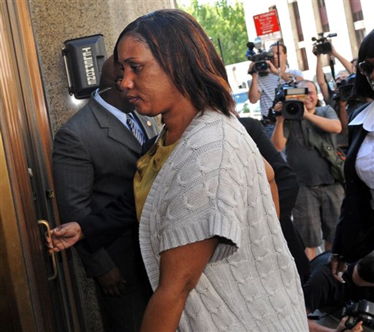 Hotel maid Nafissatou Diallo arrives at Manhattan criminal court for a meeting with New York City prosecutors investigating the sex assault case against Dominique Strauss-Kahn Wednesday, July 27, 2011, in New York. Diallo broke her silence in recent days with interviews in Newsweek and on a series of ABC News programs.  (AP Photo/ Louis Lanzano) (AP)