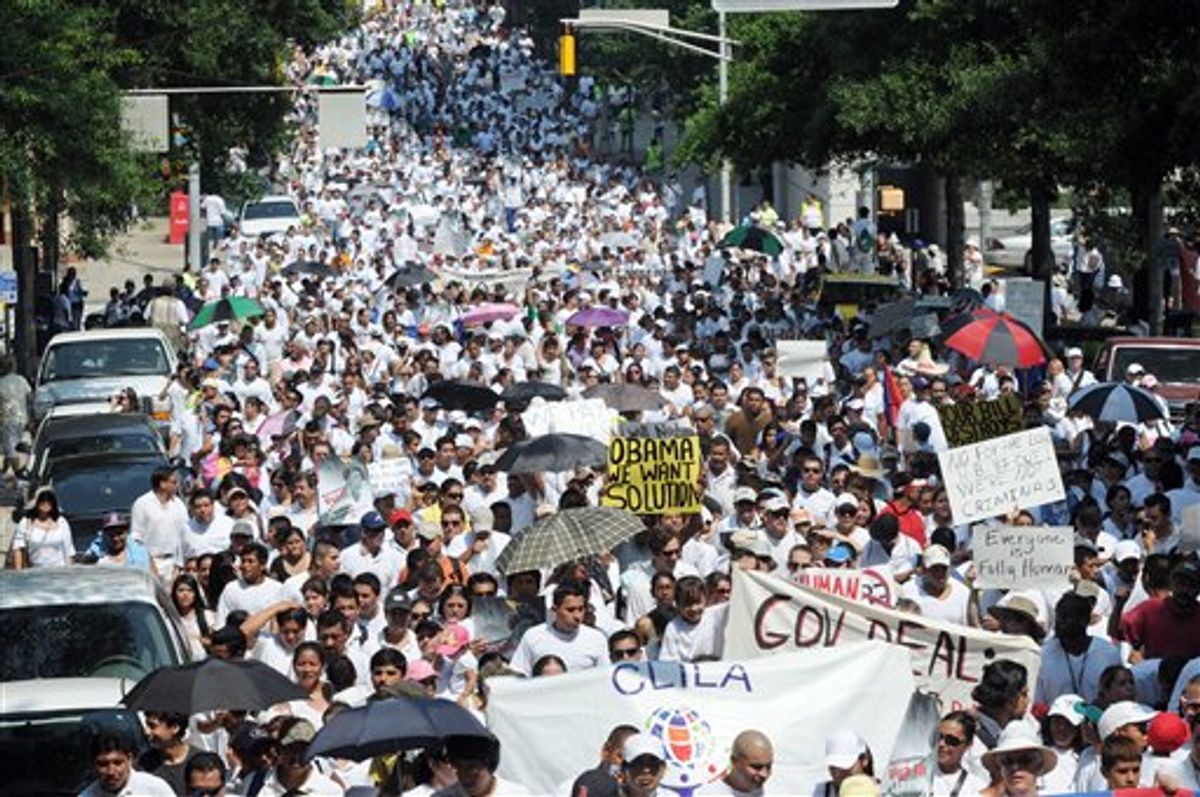Demonstrators display towards Georgia’s immigration regulation