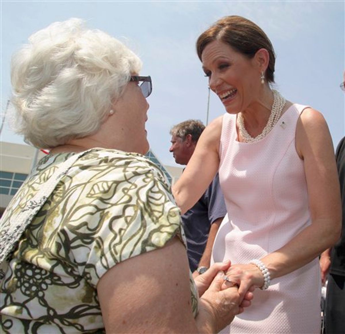 Republican presidential candidate, Rep. Michele Bachmann, R-Minn. greats a supporter outside the Myrtle Beach Convention Center  in Myrtle Beach, S.C., Friday, August 19, 2011. (AP Photo/Willis Glassgow) (AP)
