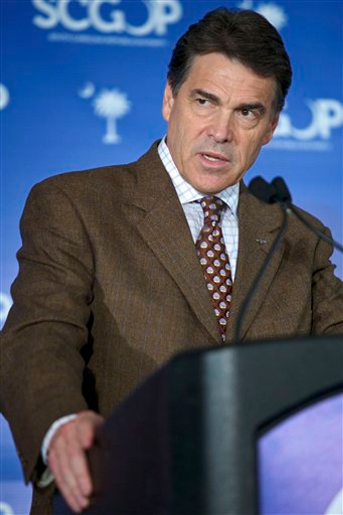Republican presidential candidate, Texas Gov. Rick Perry, speaks to members of the South Carolina GOP during a lunch in Columbia, S.C., Friday, August 19, 2011.  (AP Photo/Brett Flashnick)  (AP)