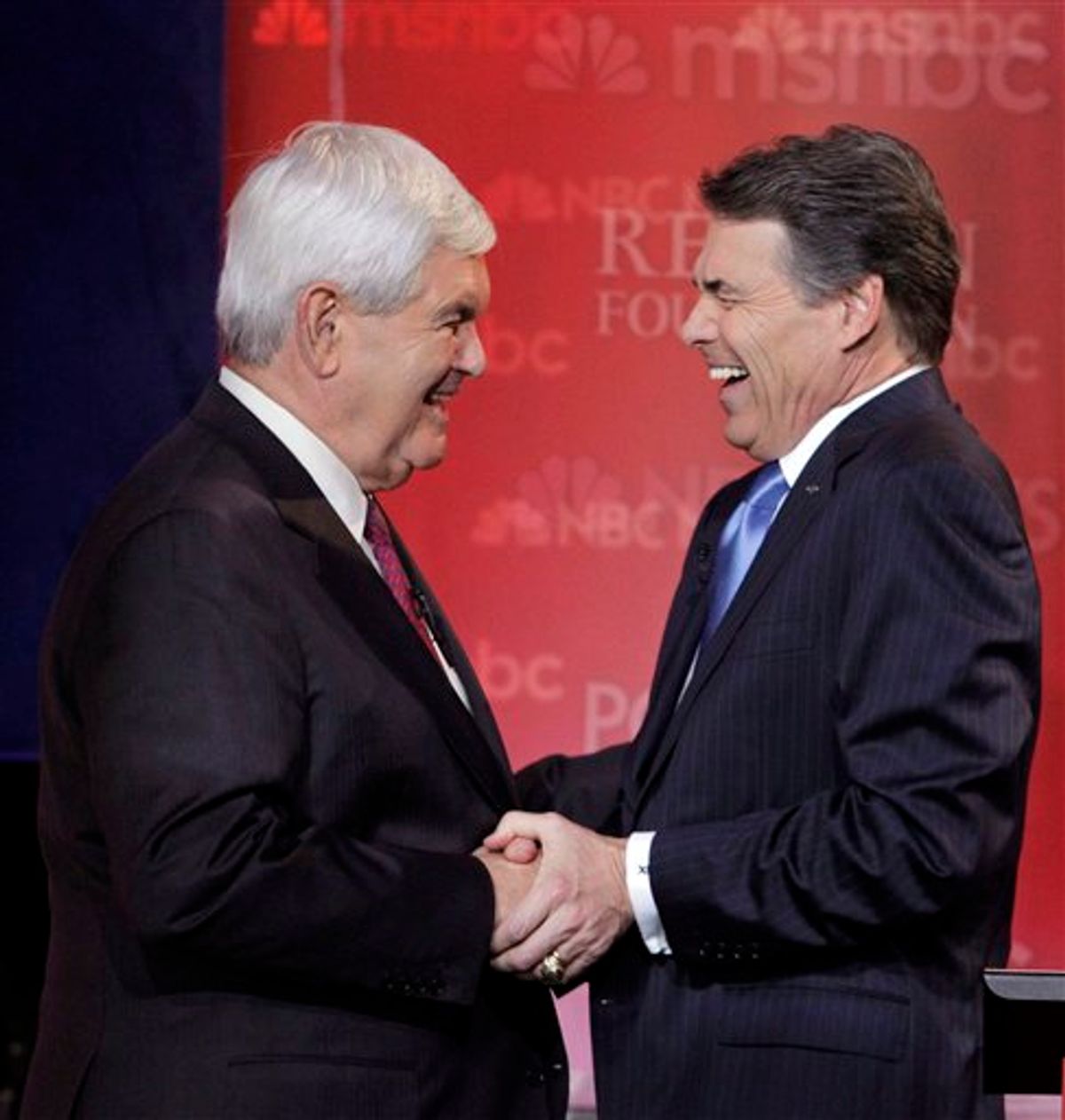 Republican presidential candidates former House Speaker Newt Gingrich, left, and Texas Gov. Rick Perry share a laugh during a break at a Republican presidential candidate debate at the Reagan Library Wednesday, Sept. 7, 2011, in Simi Valley, Calif.  (AP Photo/Jae C. Hong)  (AP)