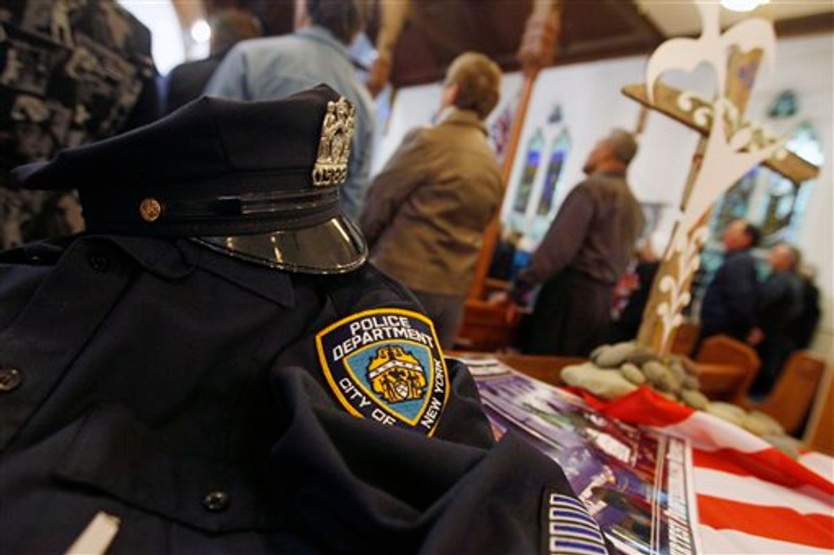 A uniform from the NYPD is displayed  during a special service to commemorate the 10th anniversary of the Sept. 11 terrorist attacks, at a church in New Plymouth, New Zealand, Sunday, Sept. 11, 2011. The US team will play Ireland in their opening Rugby World Cup game later today.  (AP Photo/Dita Alangkara) (AP)