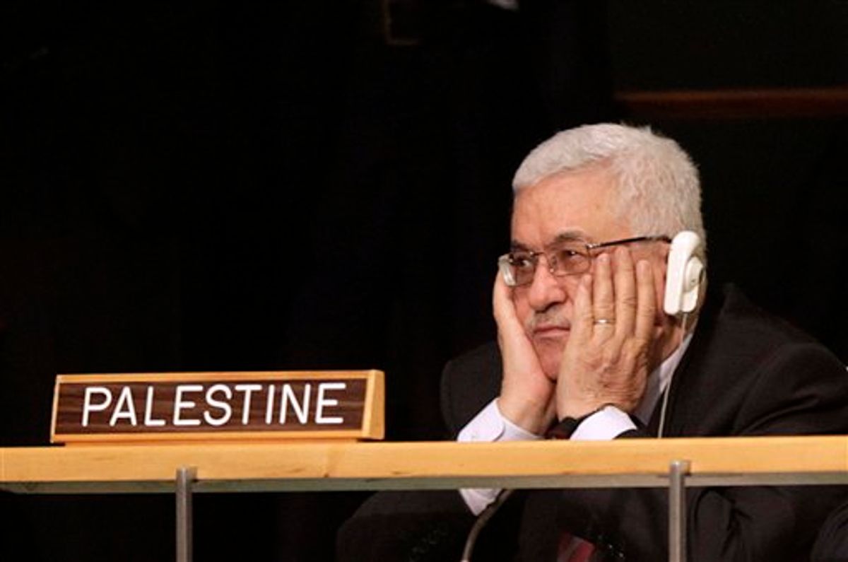 Palestinian President Mahmoud Abbas holds his hands to his face as U.S. President Barack Obama speaks during the 66th session of the General Assembly at United Nations headquarters Wednesday, Sept. 21, 2011.  (AP Photo/Seth Wenig) (AP/Seth Wenig)