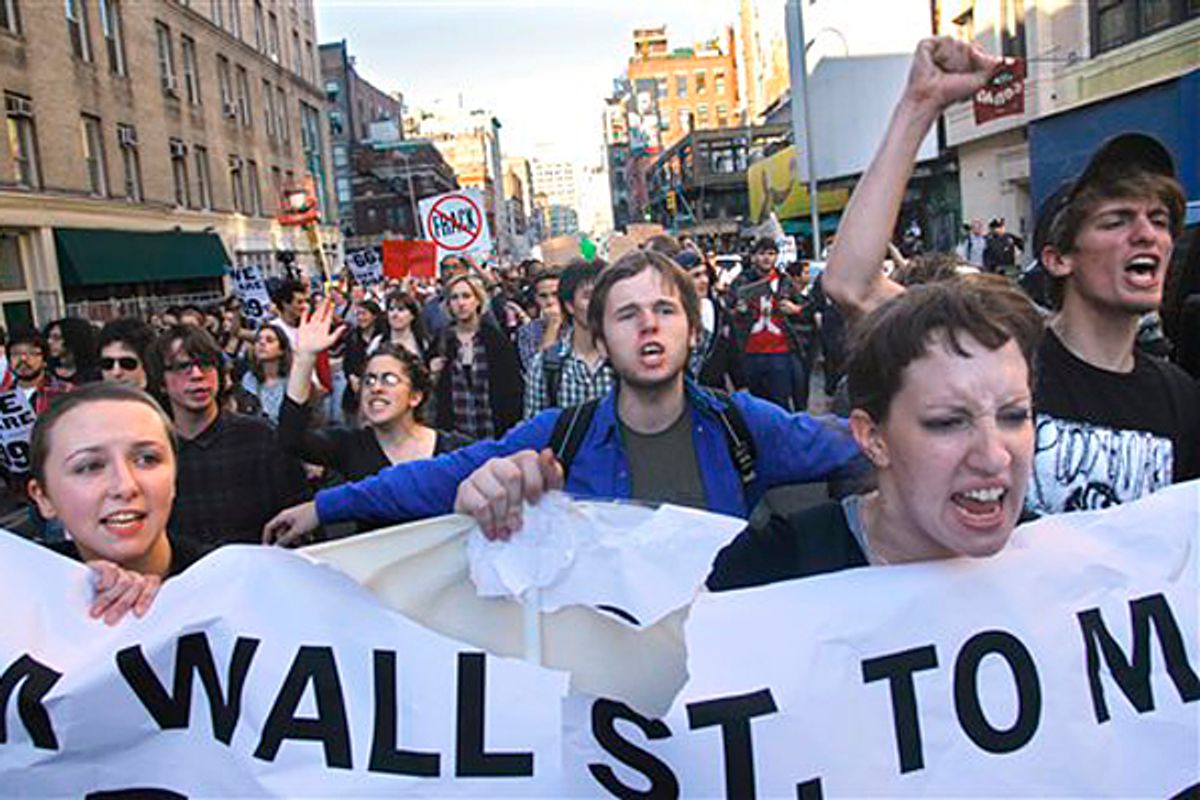 A coalition of students and their supporters from New York University and The New School chant march towards Zuccotti Park in lower Manhattan in New York       (AP/Bebeto Matthews)