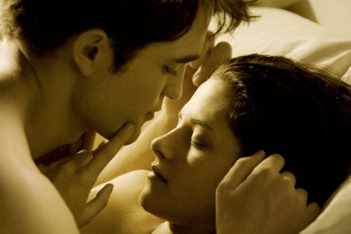 Robert Pattinson and Kristen Stewart in "Breaking Dawn"      
