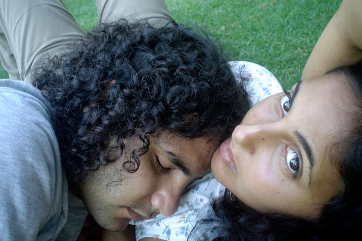 Now-jailed Egyptian blogger Alaa Abdel-Fattah, left ,and his wife, Manal Hassan.   (AP)
