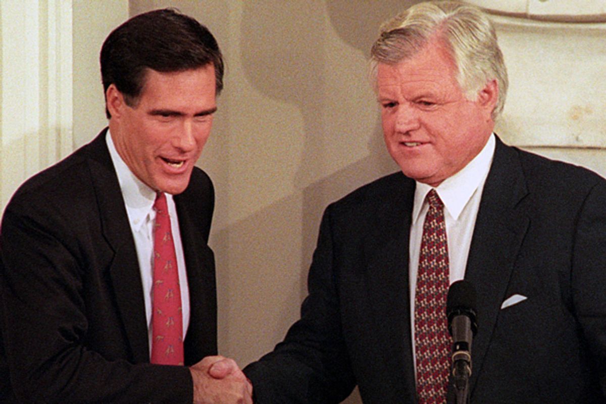 Democratic Senator Ted Kennedy (R) and his Republican challenger Mitt Romney shake hands at the start of their first debate of the campaign for the US Senate at Boston's Faneuil Hall on October 25, 1994.    (Reuters)
