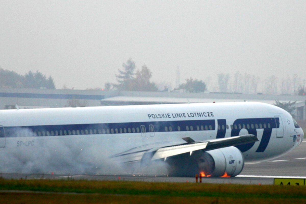 A Boeing 767 of Polish LOT airlines makes an emergency landing at Warsaw airport, Nov. 1, 2011.    (AP)