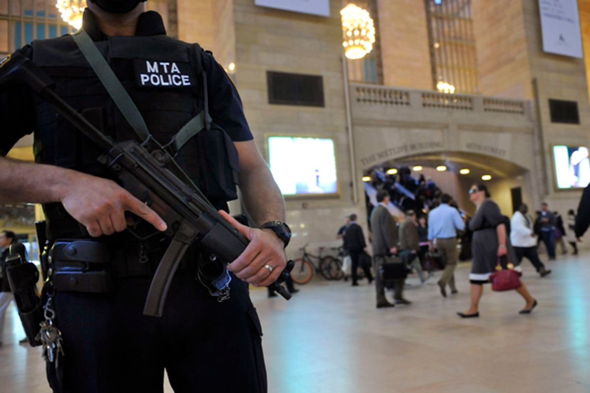An armed Metropolitan Transportation Authority police officer stands guard in New York's Grand Central Station on  Monday, May 2, 2011.       (AP/Stephen Chernin)