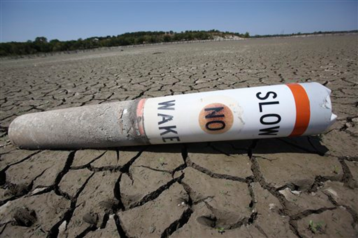 A buoy sits high and dry at Benbrook Lake in Benbrook, Texas on August 16, 2011              (AP Photo/LM Otero)