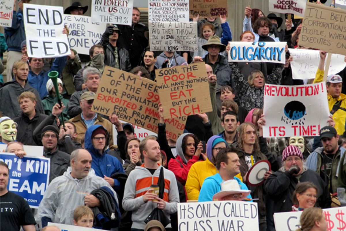 Occupy protesters on the Capitol steps in Boise, Idaho.  (AP/Jessie L. Bonner)