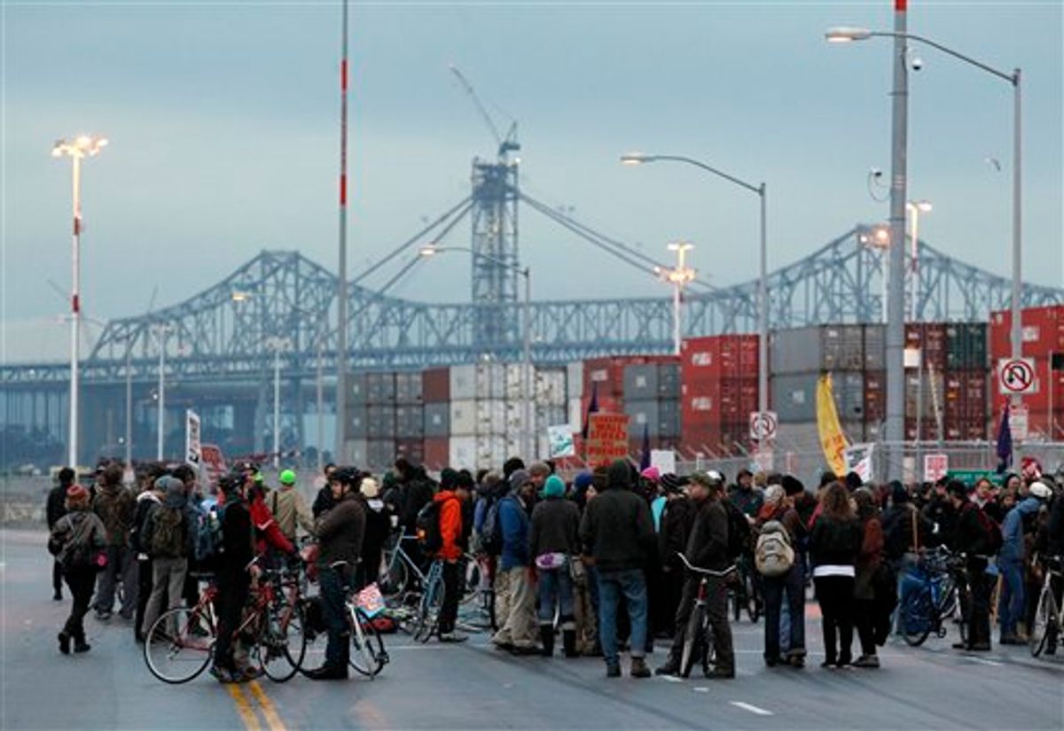 Protesters block one of the entrances to the Port of Oakland on Monday Dec. 12.   (AP)