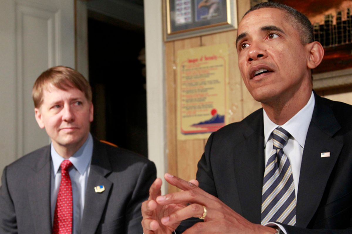 President Barack Obama, accompanied by Richard Cordray, speaks during his visits with William and Endia Eason, not pictured, Wednesday, Jan. 4, 2012, at their home in Cleveland, Ohio.   (AP/Haraz N. Ghanbari)
