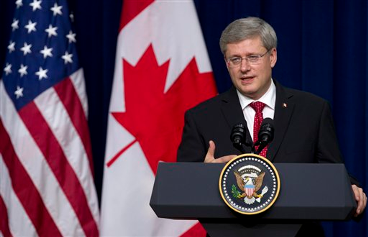Canadian Prime Minister Stephen Harper speaks at the White House complex in Washington, Wednesday, Dec. 7, 2011      (AP Photo/Carolyn Kaster)