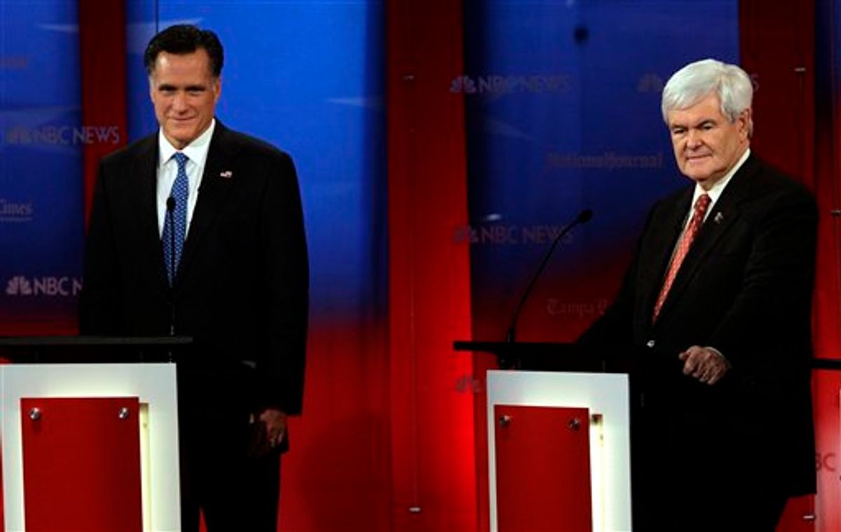 Republican presidential candidates, former Massachusetts Gov. Mitt Romney, left, stands next to former House Speaker Newt Gingrich before a Republican Presidential debate Monday Jan. 23, 2012, at the University of South Florida in Tampa, Fla. (AP Photo/Paul Sancya)      (AP)