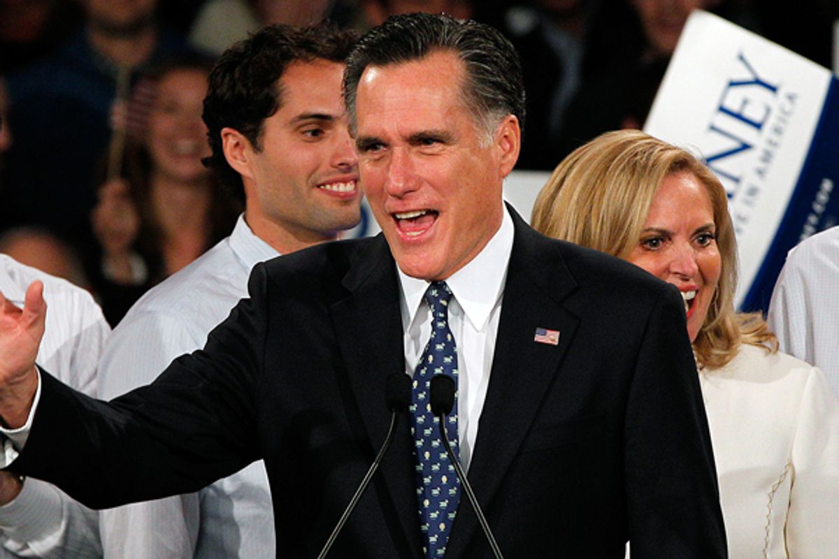 Mitt Romney celebrates at his New Hampshire primary election victory party.  (AP/Charles Dharapak)