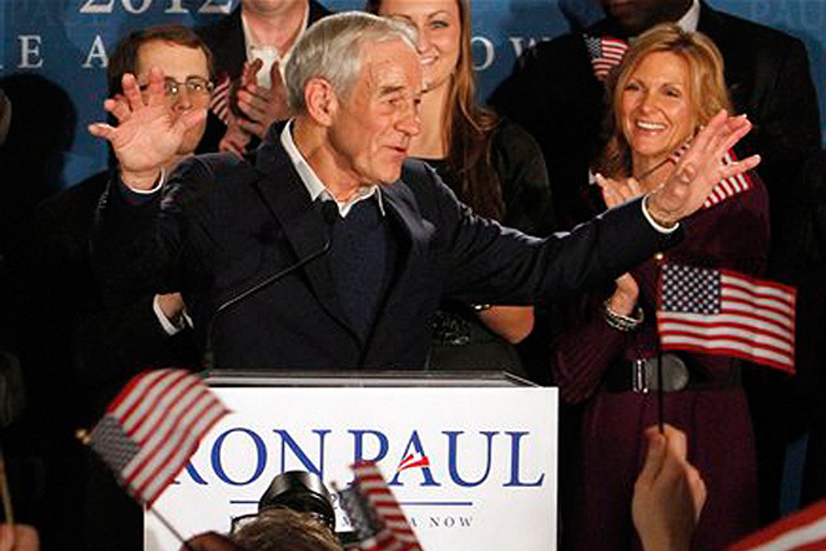 Ron Paul speaks to supporters Tuesday night.    (AP/Bill Sykes)