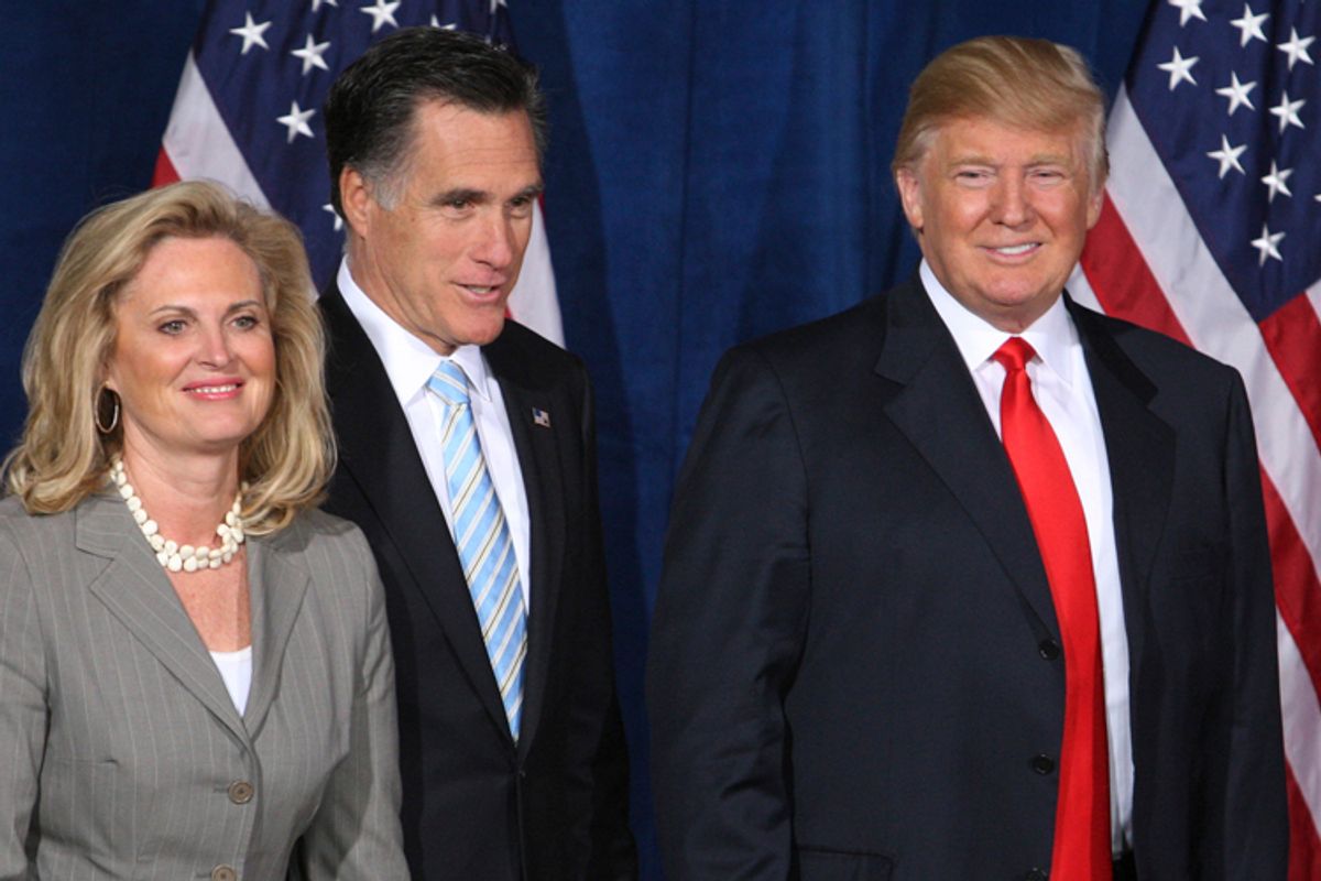Republican presidential candidate and former Massachusetts Governor Mitt Romney (C) is endorsed by businessman and real estate developer Donald Trump at the Trump Hotel in Las Vegas, Nevada February 2, 2012.      (Steve Marcus / Reuters)