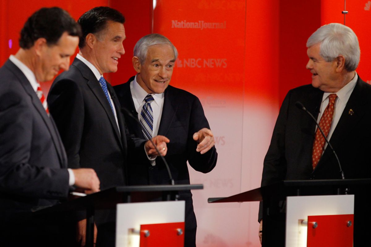 Republican presidential candidate Rick Santorum listens as fellow candidates Mitt Romney, Ron Paul, and Newt Gingrich chat during a break in the Republican presidential candidates debate in Tampa, Florida, January 23, 2012.     (Reuters)