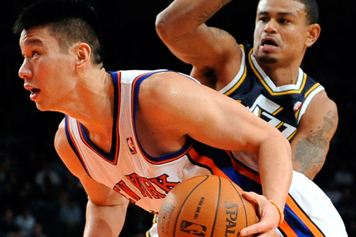 Jeremy Lin drives the ball past Earl Watson during the second half of Monday nights game.
    (AP/Kathy Kmonicek)
