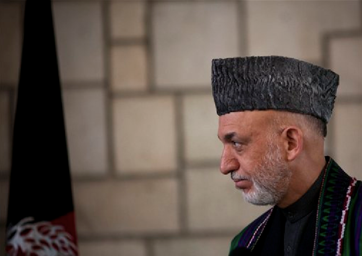 Afghan President Hamid Karzai looks on during a news conference in Kabul, Afghanistan, Tuesday, March 6, 2012.     (AP Photo/Anja Niedringhaus)