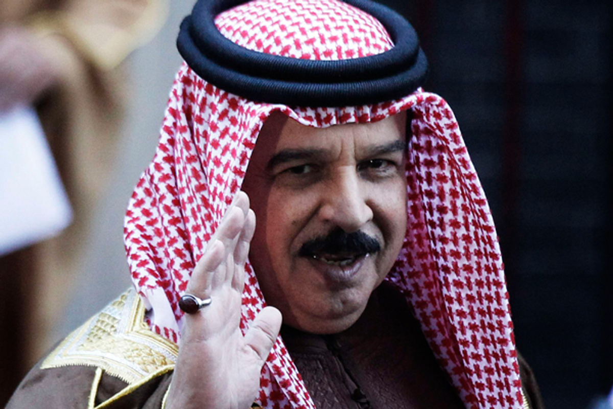  Bahrain's King Hamad bin Isa al-Khalifa waves as he leaves 10 Downing Street in London, December 12, 2011  (Reuters/Finbarr O'Reilly)