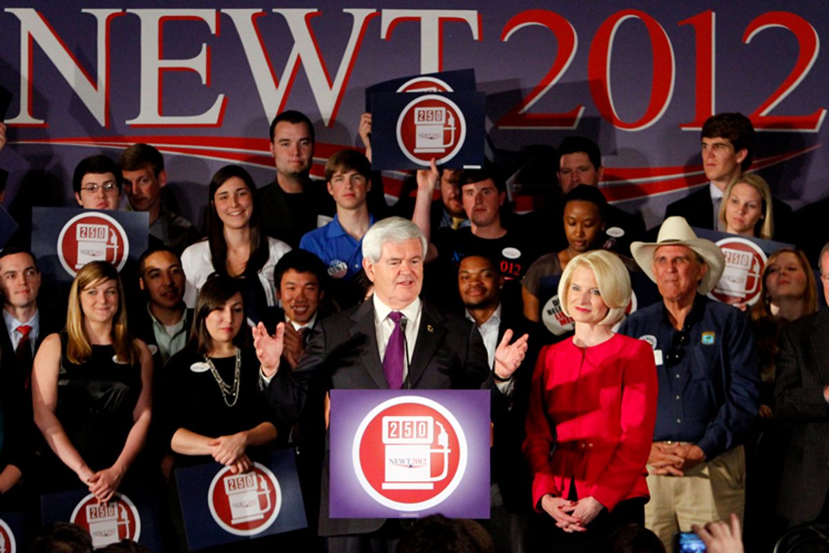 Republican presidential candidate former House Speaker Newt Gingrich speaks at his primary night election rally with wife Callista on Tuesday, March 13, 2012, in Birmingham, Ala.            (AP/Butch Dill)