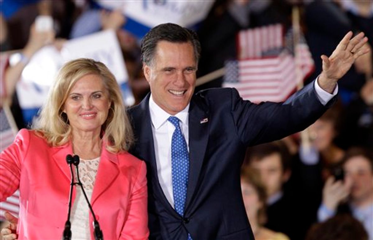 Republican presidential candidate, former Massachusetts Gov. Mitt Romney and his wife Ann wave to supporters at his Super Tuesday campaign rally in Boston, Tuesday night, March 6, 2012. (AP Photo/Stephan Savoia)    (AP)