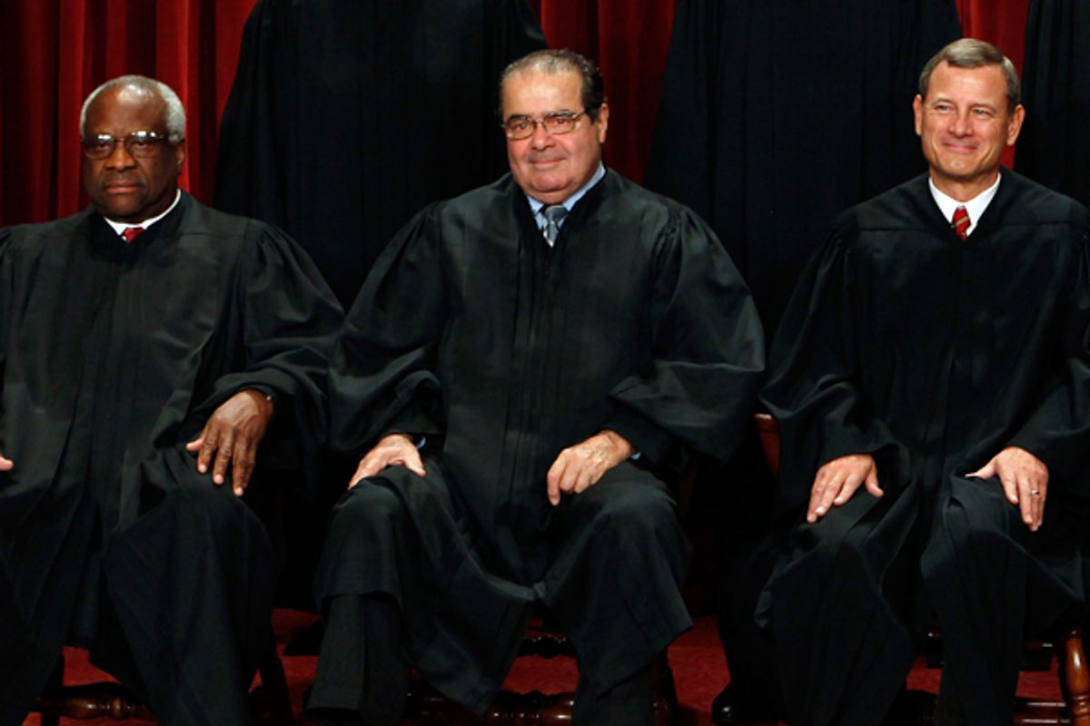 Clarence Thomas, Antonin Scalia and John Roberts     (Reuters/Larry Downing)