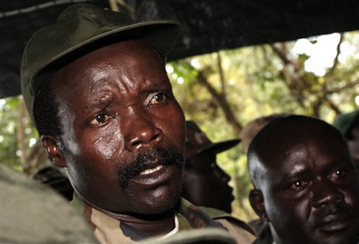 In this Nov. 12, 2006 file photo, the leader of the Lord's Resistance Army, Joseph Kony answers journalists' questions following a meeting with UN humanitarian chief Jan Egeland at Ri-Kwamba in southern Sudan    (AP Photo/Stuart Price, File, Pool)