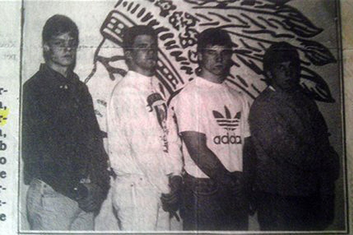 This Cincinnati Enquirer newspaper clipping provided by Steve Berling, shows Norwood High School football teammates from left, Berling, Scott Marcum, Marc Edwards and Robert Bales, posing for a photo during the 1990-91 school year, in Cincinnati. Bales is the Army soldier accused of gunning down 16 Afghan women and children in a nighttime rampage in Afghanistan.    (AP/The Cincinnati Enquirer)