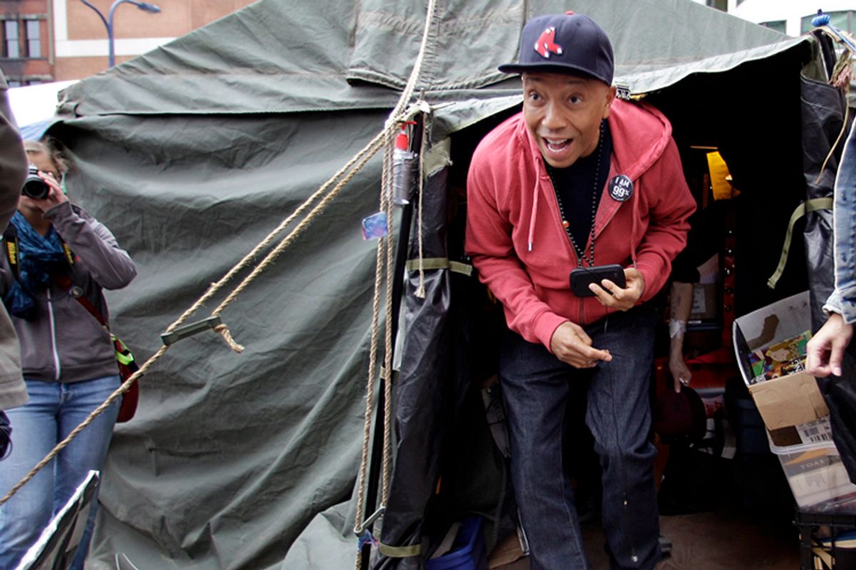 Hip-hop mogul  Russell Simmons, seen here at Occupy Boston, is co-hosting an arts festival called "All in for the 99%"       (AP/Stephan Savoia)
