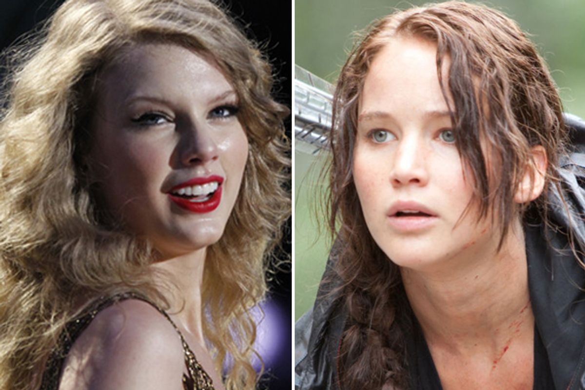 Taylor Swift, left, and Jennifer Lawrence in "The Hunger Games"   (AP/Lionsgate)