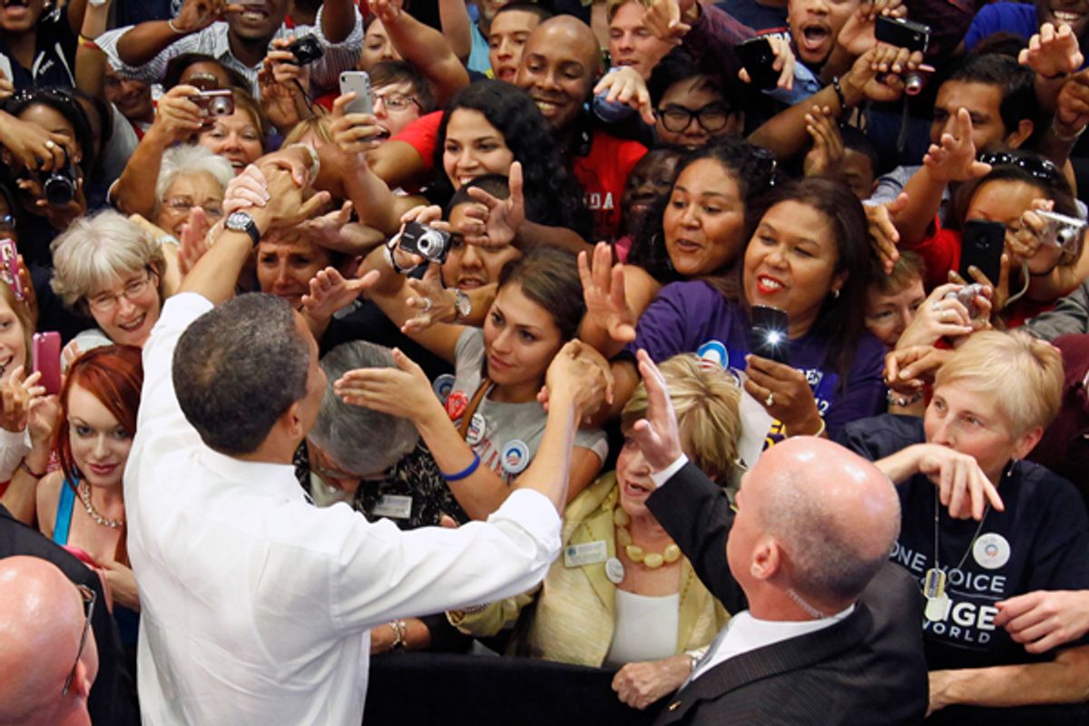 President Obama shakes hands with supporters after speaking about tax fairness and the economy in Boca Raton, Florida, on Tuesday.    (Reuters/Kevin Lamarque)