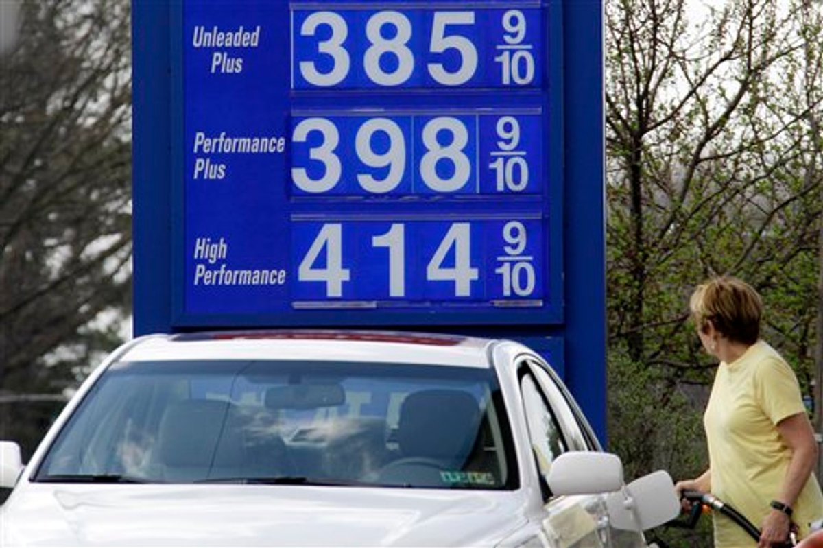 In this March 19, 2012, photo, a motorist pumps gas at a Mount Lebanon, Pa., mini-mart     (AP Photo/Gene J. Puskar)