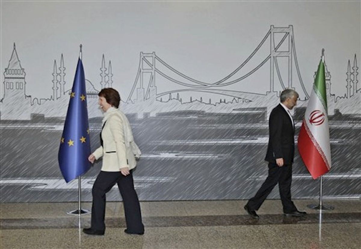Iran's Chief Nuclear Negotiator Saeed Jalili, right, and EU Foreign Policy Chief Catherine Ashton leave after they posed for cameras before their meeting in Istanbul, Turkey, Saturday, April 14, 2012     (AP Photo/Tolga Adanali, Pool)