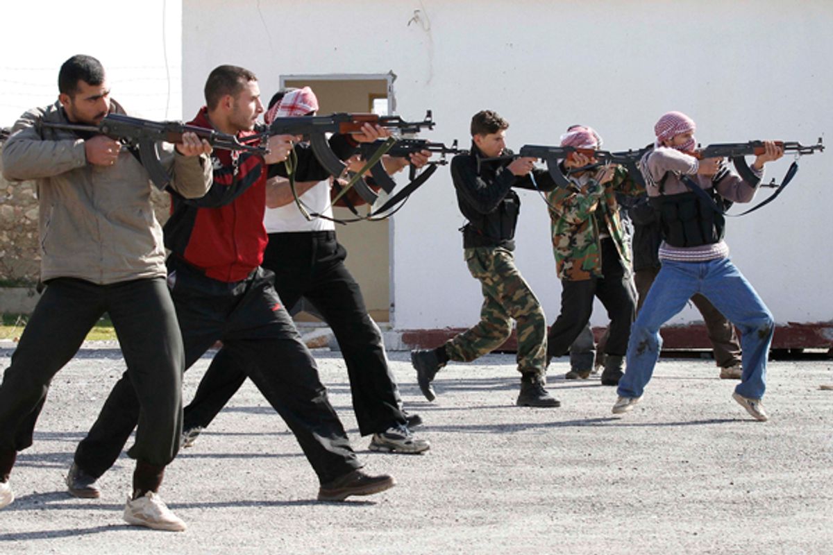 Syrian rebels aim during a weapons training exercise outside Idlib, Syria.                 (AP)