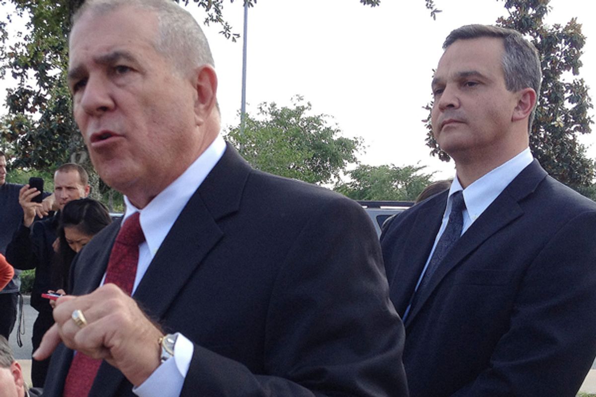 George Zimmerman's attorneys Hal Uhrig, left, and Craig Sonner speak during a news conference on Tuesday.             (AP/Tamara Lush)
