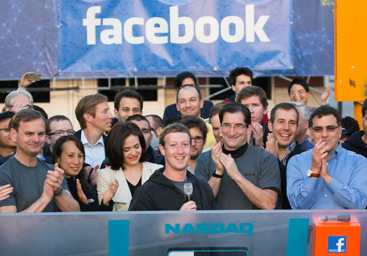 Facebook founder, Chairman and CEO Mark Zuckerberg, center, rings the Nasdaq opening bell from Facebook headquarters in Menlo Park, Calif on May 18, 2012    (AP/Zef Nikolla)