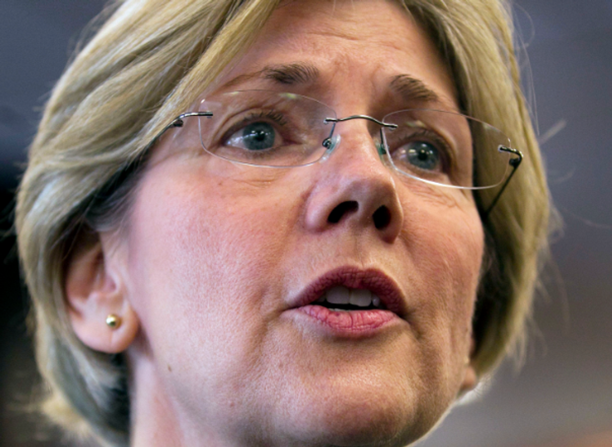 In this May 2, 2012 file photo, Democrat candidate for the U.S. Senate Elizabeth Warren responds to questions from reporters on her Native American heritage during a news conference at Liberty Bay Credit Union headquarters, in Braintree, Mass. (AP Photo/Steven Senne, File)